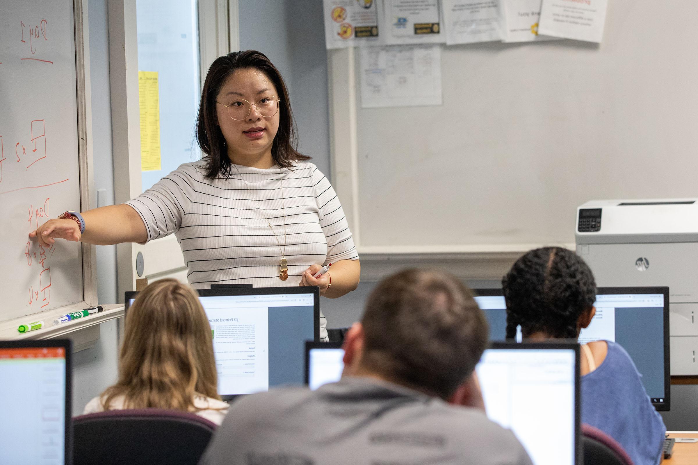 Professor Jia Wan teaches class